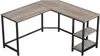 An L-shaped desk with a wood grain finish and black metal legs and shelves. Náhled obrázku produktu
