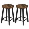 Two bar stools with wooden seats and black metal legs. Náhľad obrázku produktu