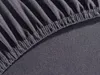 A close-up view of a dark gray jersey fitted sheet, showing the elasticized edge and the texture of the fabric. Produktbild-Vorschau