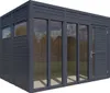 A 3D rendering of a modern dark gray garden shed with large glass windows and a single door. Náhled obrázku produktu