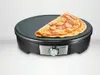 A crepe on a crepe maker. Produktbild-Vorschau