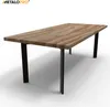 A table with a wooden top and black metal legs, presented in a studio setting with a white background and shadow. Podgląd zdjęcia produktu
