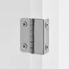 A close-up of a silver hinge attached to a white surface. Podgląd zdjęcia produktu