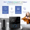 A smart thermostat and a smart speaker are displayed on a table, with a person in the background using a smartphone. The image highlights the features of the thermostat. Produktbild-Vorschau
