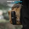 A black holster is attached to a tan backpack. Produktbild-Vorschau