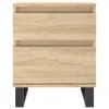 A front view of a wooden nightstand with black legs against a white background. Náhled obrázku produktu