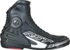 A black motorcycle boot with white branding, shown from the side against a white background. Podgląd zdjęcia produktu