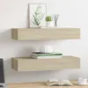 Two wooden shelves mounted on a white wall above a desk. Produktbild-Vorschau