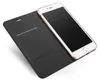 A rose gold iPhone is placed inside an open black flip case on a white background. Anteprima dell’immagine prodotto