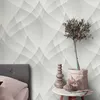 A bedroom setting with a bed and a side table with decorative items. Produktbild-Vorschau