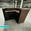 A reception desk in a warehouse or large open space. Voir les images du produit