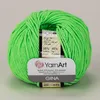 A ball of bright green yarn with a label attached. Náhľad obrázku produktu