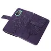 A purple flip-style phone case with a butterfly and floral embossed design, shown open with a phone inserted. Produktbild-Vorschau
