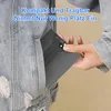 A hand is placing a compact electronic device into the pocket of a denim jacket. Produktbild-Vorschau