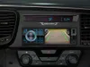 A car's dashboard with a car stereo system displaying a backup camera view. Produktbild-Vorschau