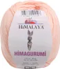 A ball of pink yarn with a label attached. Podgląd zdjęcia produktu