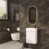 A modern bathroom with dark marble tiles, a wall-mounted toilet, a vanity with a sink and faucet, and a heated towel rack. Produktbild-Vorschau