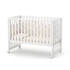 A white baby crib with beige padding, shown on a white background. Anteprima dell’immagine prodotto