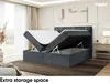 A bedroom scene with a bed featuring a lifted mattress to reveal storage space. Produktbild-Vorschau