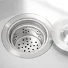 A close-up view of a stainless steel sink drain with a removable strainer basket. Náhled obrázku produktu