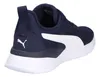 A rear view of a navy blue Puma sneaker with a white stripe and sole. Produktbild-Vorschau
