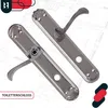Two silver door handles with decorative plates are shown on a blueprint background. Produktbild-Vorschau