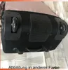 Close-up view of the bottom of a rolling suitcase, showing the wheels and handle. Voir les images du produit