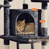 A cat sleeping in a condo on a cat tree. Produktbild-Vorschau