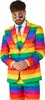 A man wearing a rainbow-striped suit, shirt, and tie. Produktbild-Vorschau
