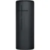 A black cylindrical speaker with a textured fabric exterior and a subtle cross-shaped logo on the front. Produktbild-Vorschau