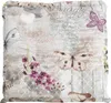 A close-up view of a cushion cover with a butterfly and floral pattern. Produktbild-Vorschau