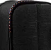 Close-up of the corner of a black suitcase. Produktbild-Vorschau