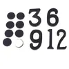 A collection of black numbers and circular discs are arranged on a white background. Náhled obrázku produktu
