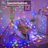 A decorated room with string lights draped over furniture and a teepee. Produktbild-Vorschau