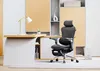 A modern office setup with a desk and an ergonomic chair. Náhled obrázku produktu