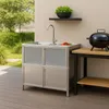 An outdoor kitchen sink and grill area. Produktbild-Vorschau