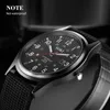 Close-up of a men's wristwatch with a black dial and a black nylon strap. Produktbild-Vorschau