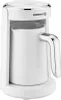 A white electric coffee maker with a silver handle and trim, shown from a front-side angle on a white background. Anteprima dell’immagine prodotto
