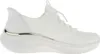 A white women's sneaker with a silver accent. Voir les images du produit