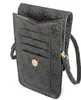 A close-up view of a gray Guess handbag with a repeating logo pattern. Podgląd zdjęcia produktu