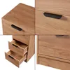 A collage of close-up shots of a wooden chest of drawers with black handles. Anteprima dell’immagine prodotto
