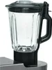 A close-up view of a blender jar with its lid and handle, attached to a kitchen appliance base. Produktbild-Vorschau