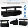 A black TV stand with multiple storage compartments and drawers, shown with illustrative icons and text describing its storage capabilities. Anteprima dell’immagine prodotto