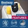 A close-up of a Bestway Lay-Z-Spa control panel with two glasses of orange juice in holders. Produktbild-Vorschau