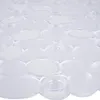 A close-up, angled view of a transparent bath mat with a pebble-like texture and suction cups. Náhľad obrázku produktu