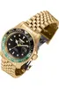 A close-up, angled view of a gold-colored wristwatch with a black dial and a green bezel. Náhled obrázku produktu