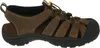 A side view of a brown leather sandal with black accents and a black sole. Produktbild-Vorschau