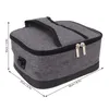A gray insulated lunch bag with two zipper closures and a handle on top. Náhľad obrázku produktu