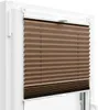 A close-up view of a brown pleated blind installed in a white window frame. Produktbild-Vorschau