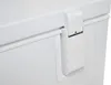 Close-up detail of a white chest freezer latch. Produktbild-Vorschau